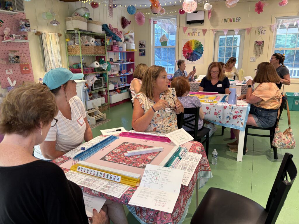 Ladies learning American Mahjong during a beginner class at Pink Art Pixie in Joppa, Maryland